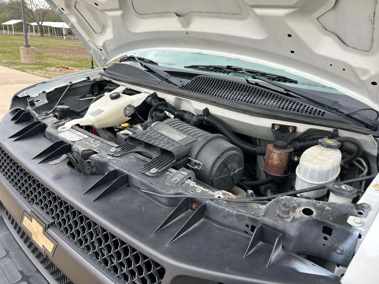 2011 White /Gray Chevrolet Express 2500 Cargo (1GCWGFCB9B1) with an 3.6L V6 DOHC 16V engine, 4-Speed Automatic transmission, located at 17760 Hwy 62, Morris, OK, 74445, (918) 733-4887, 35.609104, -95.877060 - 2011 CHEVY EXPRESS HAS THE 3.6L V6 ENGINE. THIS IS A DEDICATED CNG (ONLY RUNS ON COMPRESSED NATURAL GAS). MANUAL SEATS, MANUAL LOCKS, MANUAL, MIRRORS, MANUAL WINDOWS, AMFM STEREO, A/C, LEATHER SEATS, LEATHER-WRAPPED STEERING WHEEL, TRACTION CONTROL, LOCKING METAL CONSOLE, STEEL SHELVES, SPLIT SWING- - Photo#20